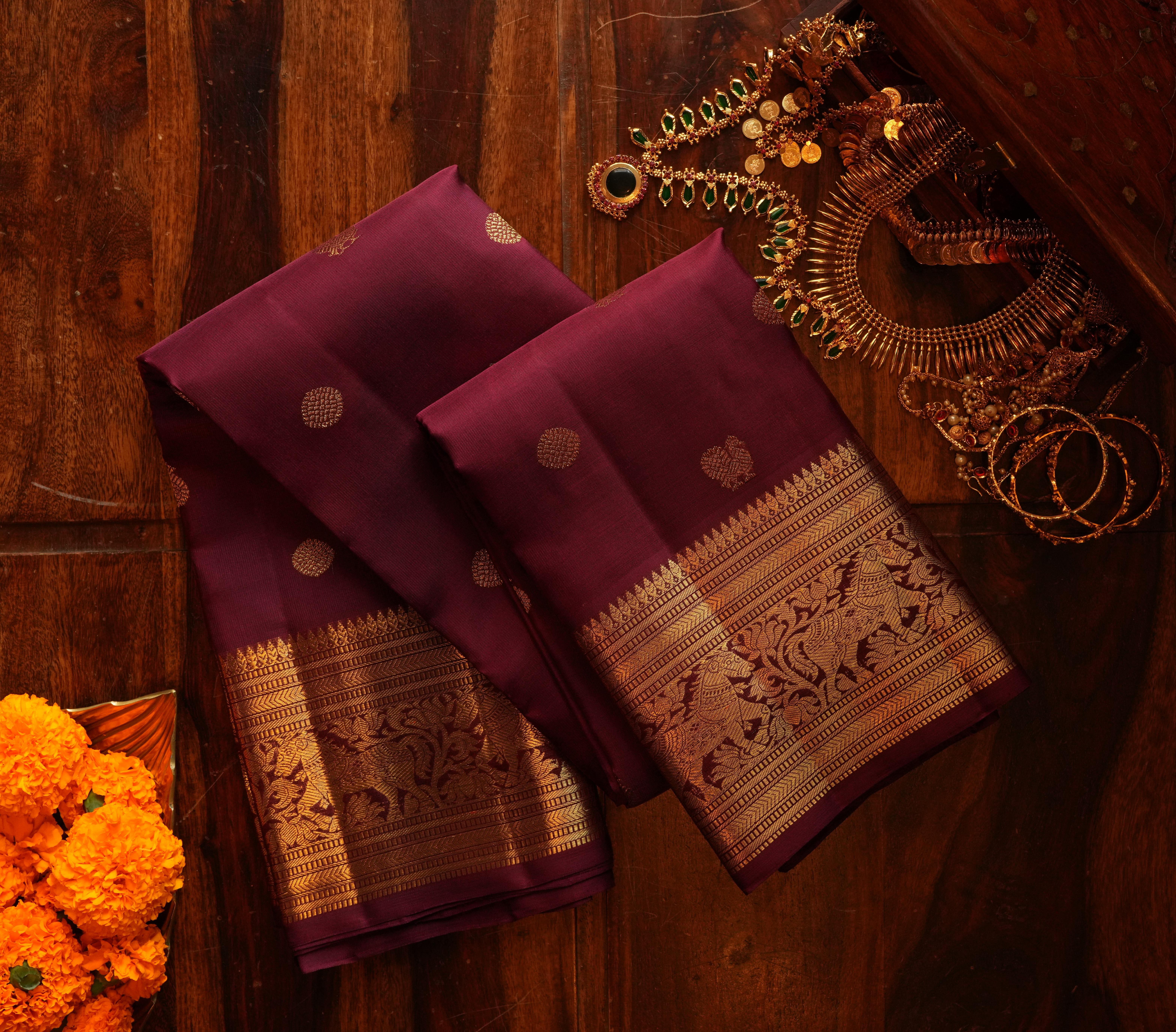 Pure Kanchipuram Silk Saree in Royal Wine Purple with Grand Gold Zari Pallu